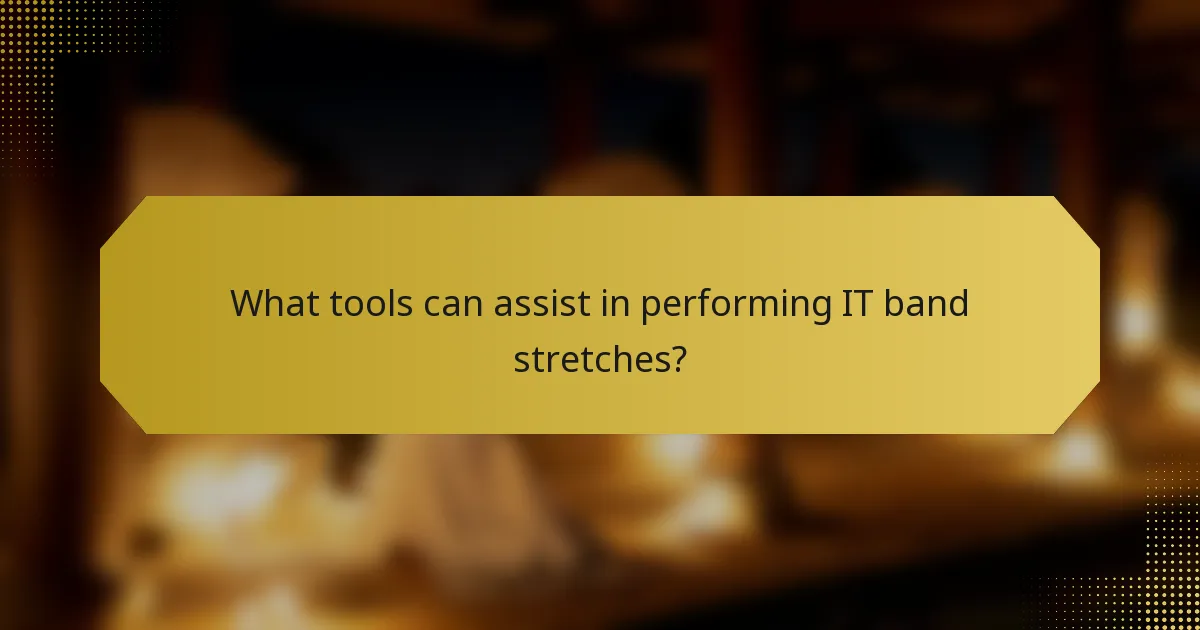 What tools can assist in performing IT band stretches?
